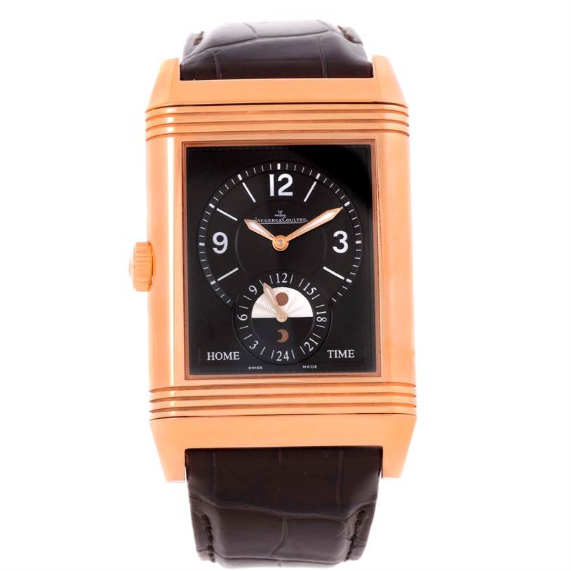 The Jaeger-LeCoultre Reverso watch is shown from a front angle, highlighting its rectangular face, black dial, and brown leather strap.