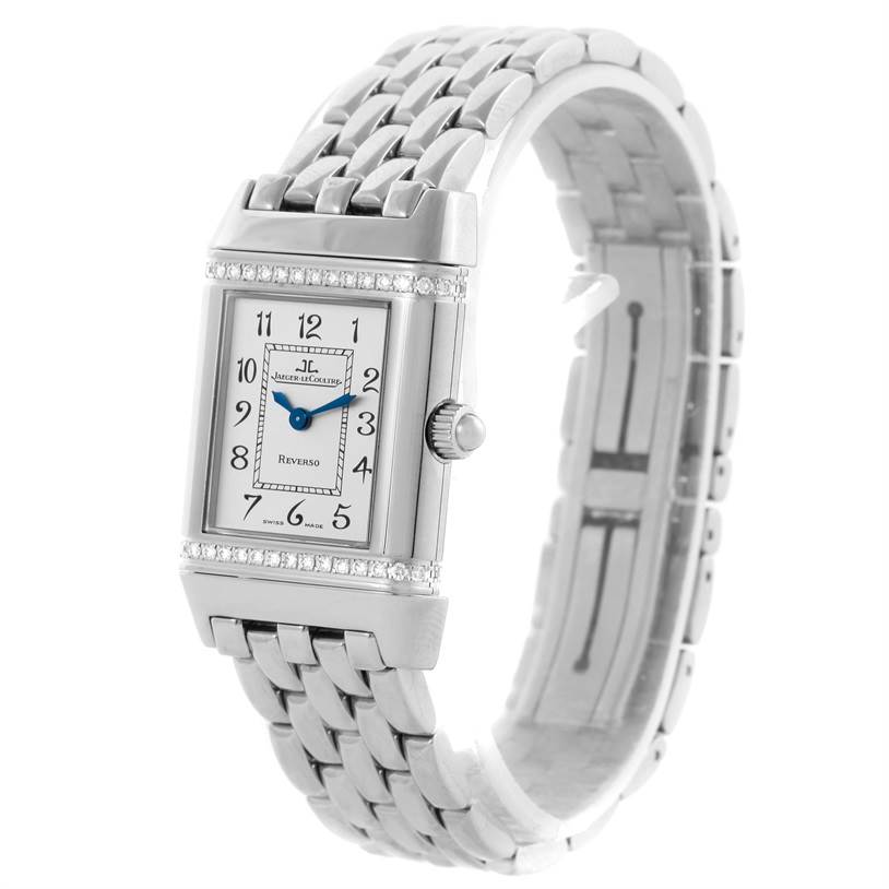 The image shows a Jaeger LeCoultre Reverso 265.8.08 Women's Stainless Steel Silver Dial 265.8.08 Women's Stainless Steel Silver Dial watch at a three-quarter angle, highlighting its face, case, crown, and metal bracelet.