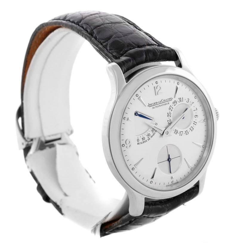 The Jaeger LeCoultre Master 140.8.93.S Men's Stainless Steel Silver Dial 140.8.93.S Men's Stainless Steel Silver Dial watch is shown at an angle, highlighting its white dial, black leather strap, and silver case.