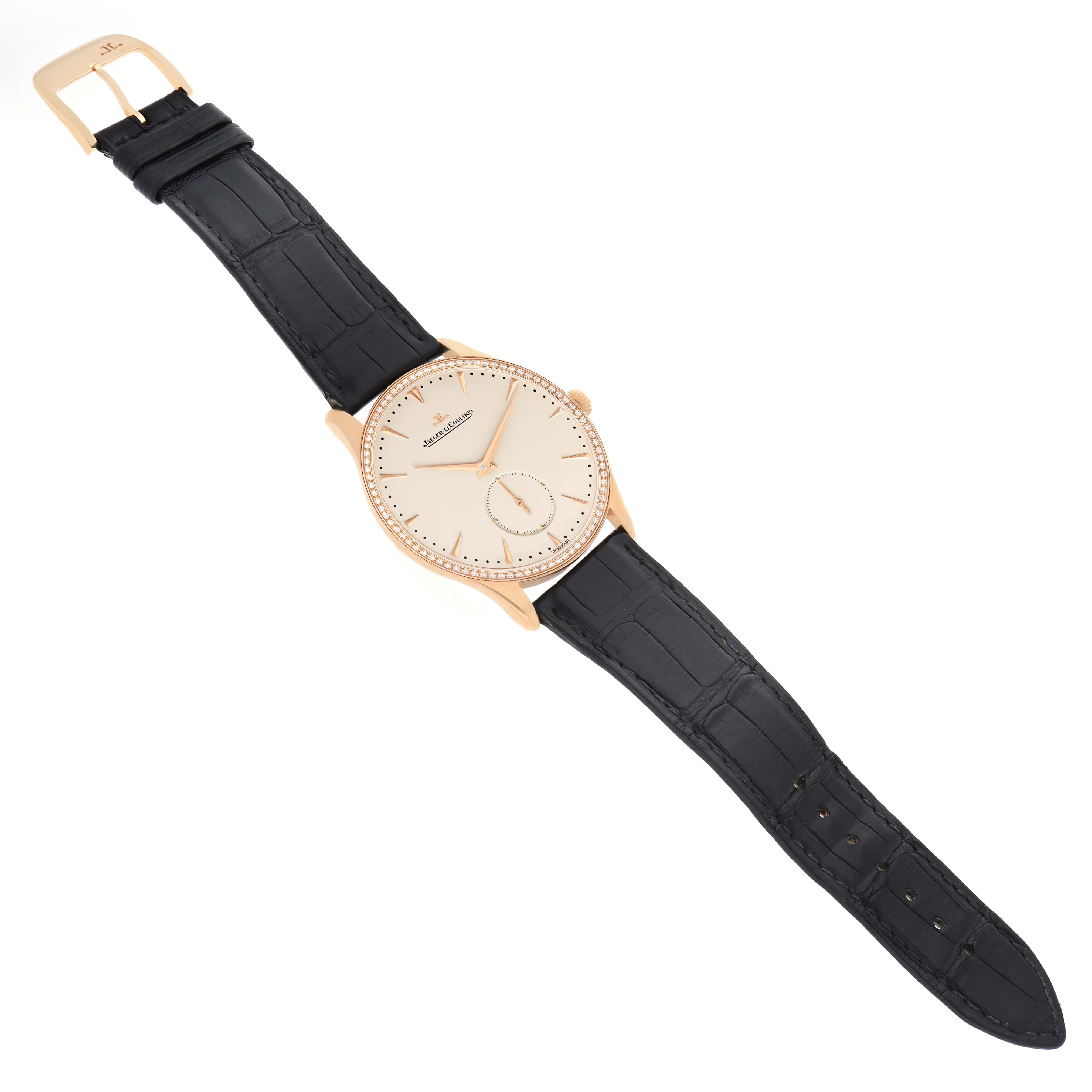 The Jaeger LeCoultre Master Q1352502 Men's Rose Gold Beige Dial Q1352502 Men's Rose Gold Beige Dial watch is shown from an angled top view, displaying the dial, case, and black leather strap.