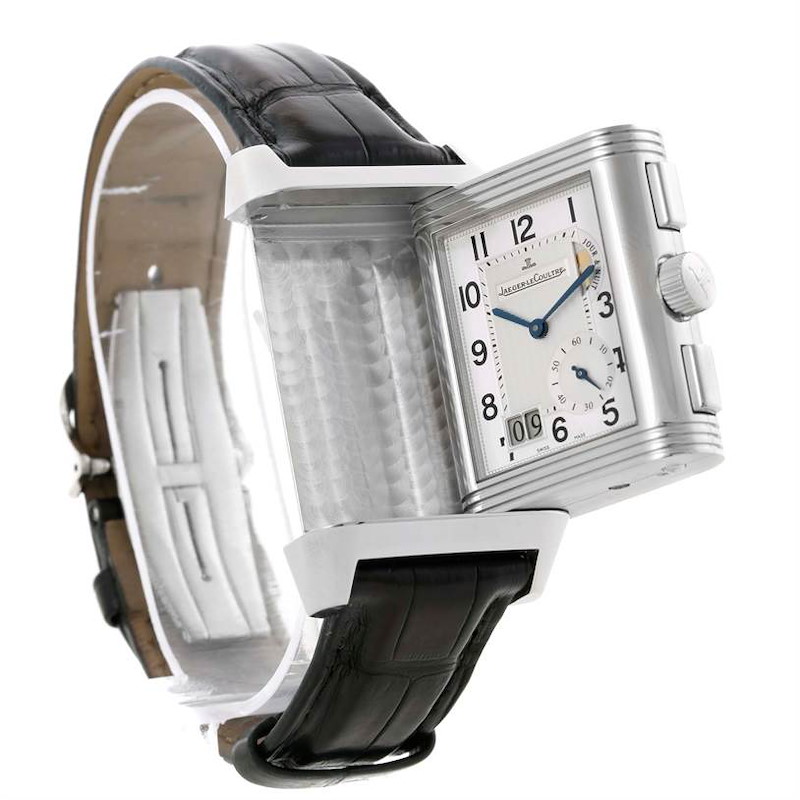 The image shows the Jaeger-LeCoultre Reverso watch at an angle that highlights its swiveling case mechanism and leather strap.