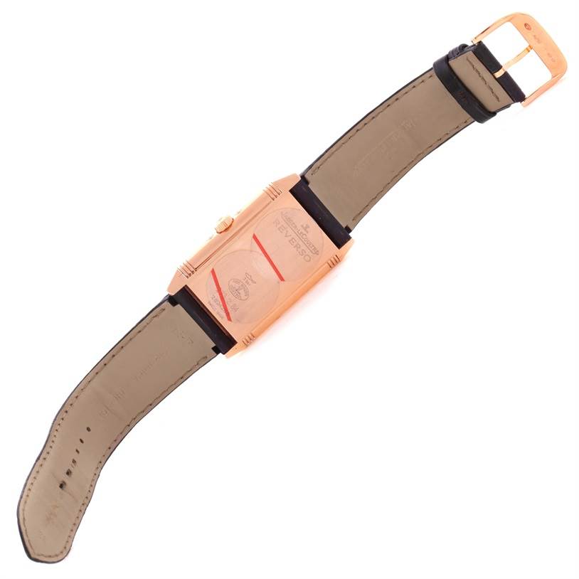 This image shows the back of a Jaeger LeCoultre Reverso Q3752520 Men's Rose Gold Silver Dial Q3752520 Men's Rose Gold Silver Dial watch, displaying the case and the attached leather strap.