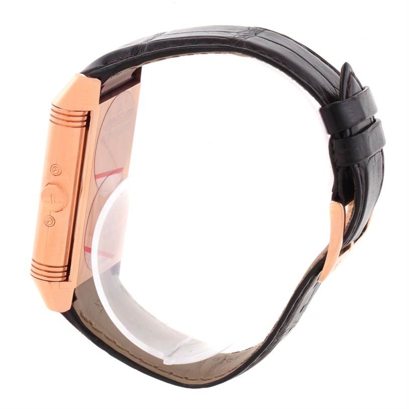 This image shows the side view of a Jaeger LeCoultre Reverso Q3752520 Men's Rose Gold Silver Dial Q3752520 Men's Rose Gold Silver Dial watch, highlighting the case and leather strap.