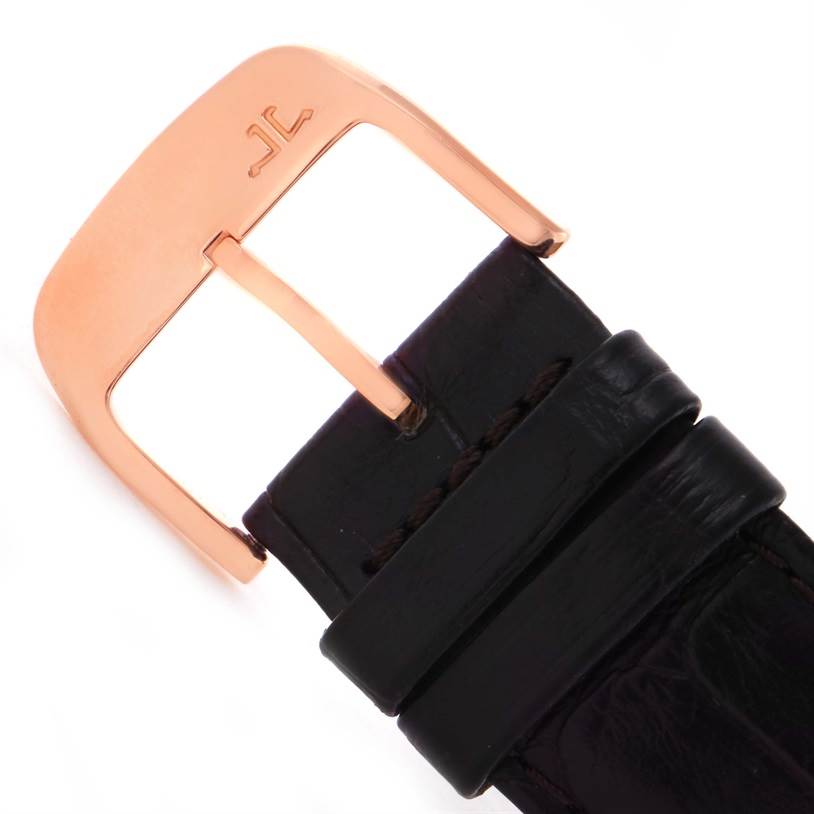 This image shows a rose gold buckle and black leather strap of a Jaeger LeCoultre Reverso Q3752520 Men's Rose Gold Silver Dial Q3752520 Men's Rose Gold Silver Dial watch.