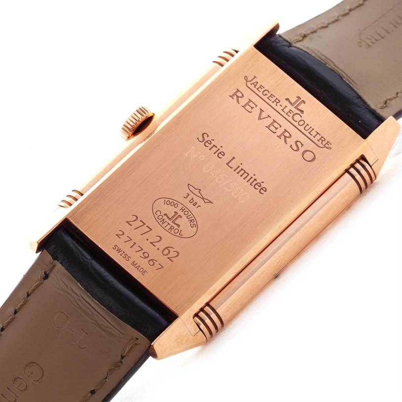 The image shows the back case of a Jaeger-LeCoultre Reverso watch with its serial number and limited edition information visible.