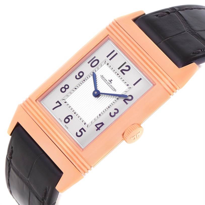 The image shows a Jaeger LeCoultre Reverso Q2782520 Men's Rose Gold Silver Dial Q2782520 Men's Rose Gold Silver Dial watch from an angled top view, featuring the dial, case, crown, and leather strap.
