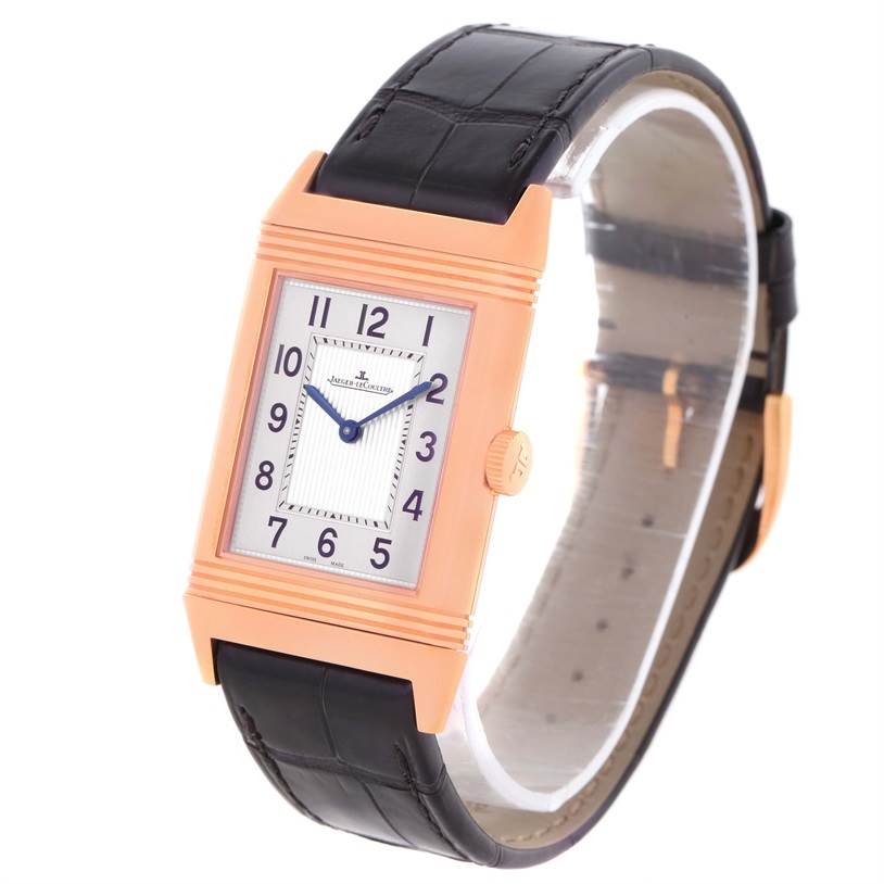 This is a Jaeger-LeCoultre Reverso watch shown from a three-quarter angle, displaying the face, case, crown, and leather strap.