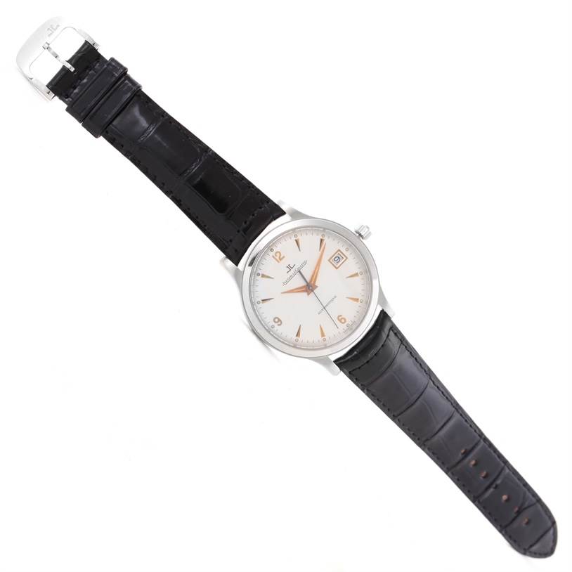 The image shows a Jaeger LeCoultre Master 140.6.89 Men's Platinum Silver Dial 140.6.89 Men's Platinum Silver Dial model watch from a top-down angle, including its face, bezel, crown, and black strap.