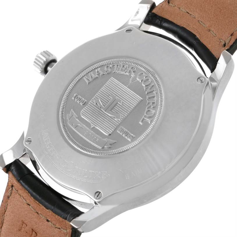 The image shows the back of the Jaeger LeCoultre Master 140.6.89 Men's Platinum Silver Dial 140.6.89 Men's Platinum Silver Dial Control watch, featuring the brand's engraving and leather strap attachment.