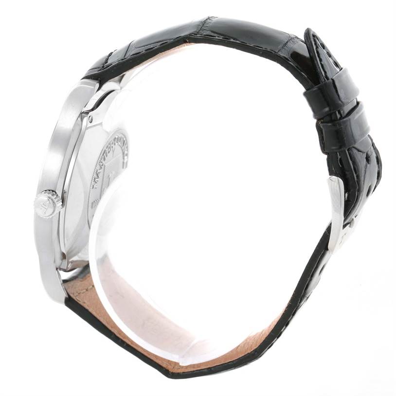 This is a side view of a Jaeger LeCoultre Master 140.6.89 Men's Platinum Silver Dial 140.6.89 Men's Platinum Silver Dial model watch, showing the crown, case, and leather strap.