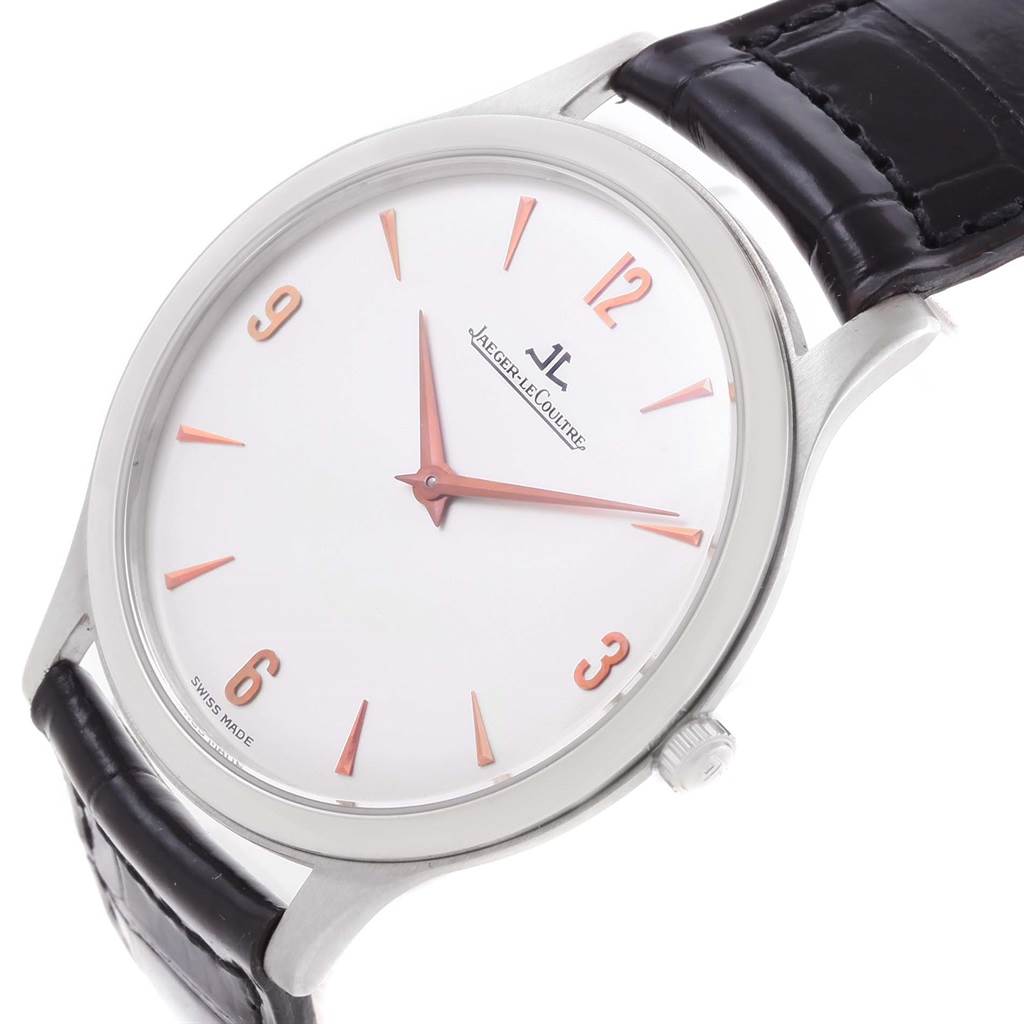 The image shows a Jaeger LeCoultre Master 145.6.79 Men's Platinum Silver Dial 145.6.79 Men's Platinum Silver Dial model watch at an oblique angle, highlighting its dial, hour markers, hands, and leather strap.