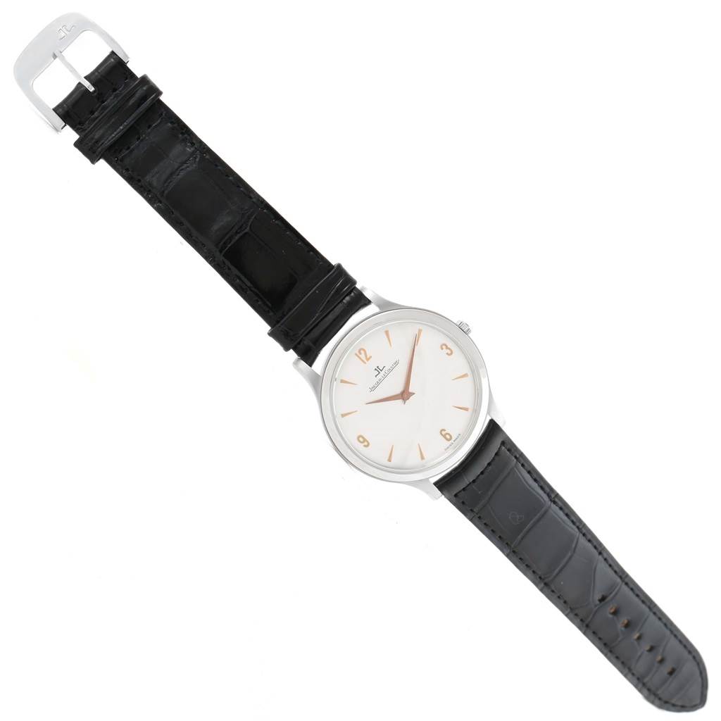 The image shows a Jaeger LeCoultre Master 145.6.79 Men's Platinum Silver Dial 145.6.79 Men's Platinum Silver Dial model watch from a top view, displaying its face, black leather strap, and buckle.