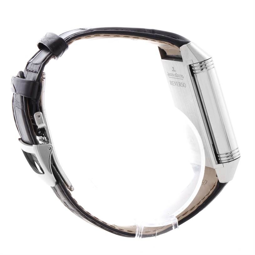 This is a side view of the Jaeger LeCoultre Reverso Q3748420 Men
s Stainless Steel Silver Dial Q3748420 Men
s Stainless Steel Silver Dial watch, showing the case, buckle, and leather strap.