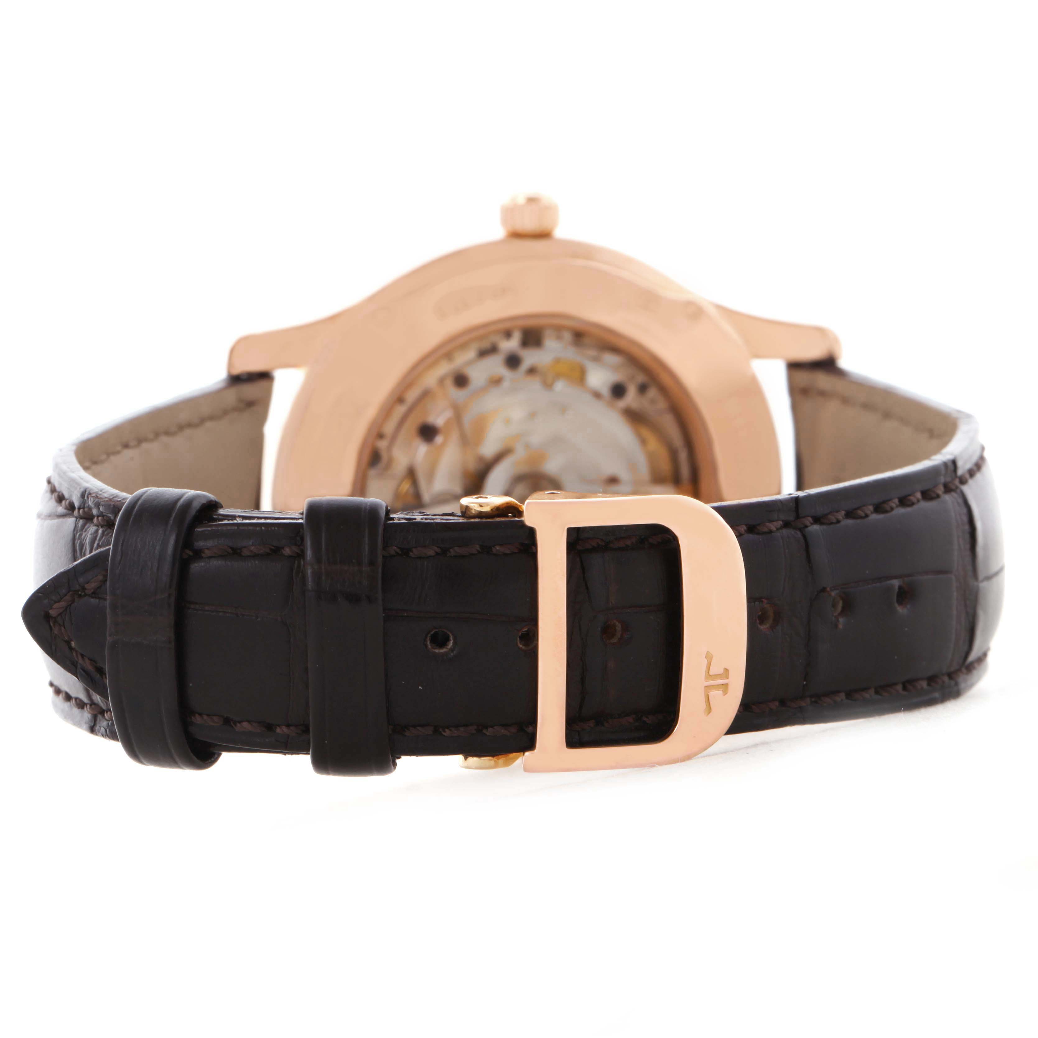 The image shows the back view of a Jaeger LeCoultre Master 147.2.37.S Men's Rose Gold Silver Dial 147.2.37.S Men's Rose Gold Silver Dial model watch, highlighting the leather strap and buckle.