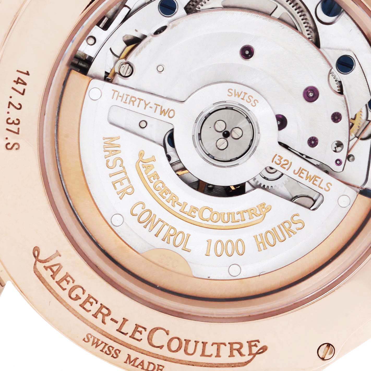 The image shows the back of a Jaeger-LeCoultre Master watch, highlighting the movement and intricate inner mechanics.
