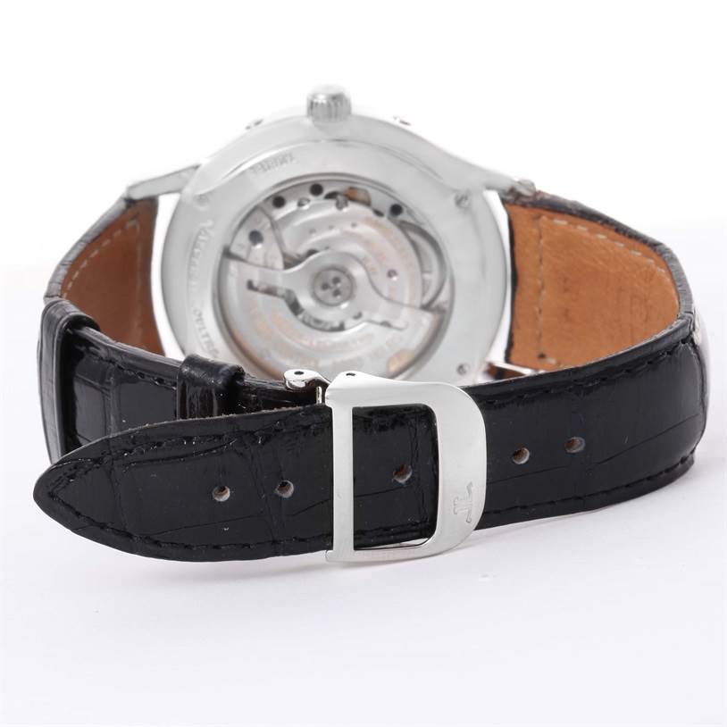 The image displays the back view of the Jaeger LeCoultre Master 140.8.98.S Men
s Stainless Steel Silver Dial 140.8.98.S Men
s Stainless Steel Silver Dial watch, focusing on the movement and black leather strap with buckle.
