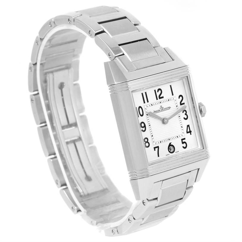 The image shows a Jaeger LeCoultre Reverso Q7048120 Stainless Steel White Dial Q7048120 Stainless Steel White Dial watch angled to display its face and stainless steel bracelet.