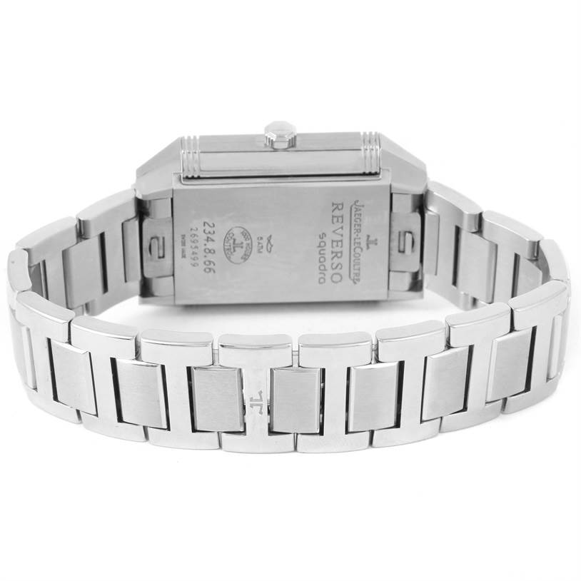 The image shows the back view of a Jaeger LeCoultre Reverso Q7048120 Stainless Steel White Dial Q7048120 Stainless Steel White Dial watch, highlighting the metal bracelet and case back.
