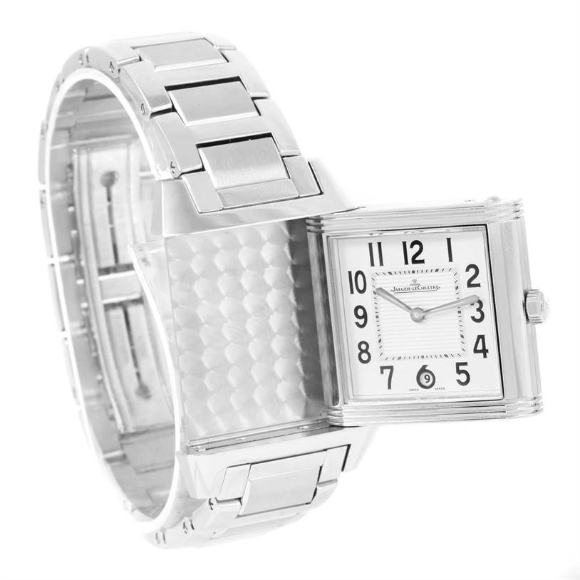 The Reverso model by Jaeger-LeCoultre is shown with its case flipped, revealing the inner mechanism and bracelet.