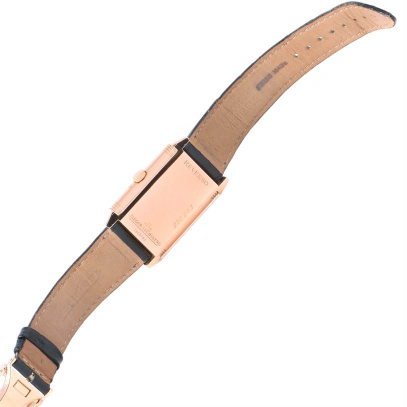 This image shows the back view of a Jaeger-LeCoultre Reverso watch with the leather strap and the watch’s casing visible.