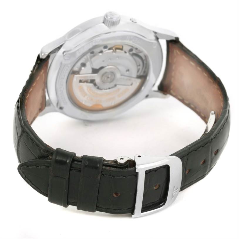 The image shows the back side and clasp of a Jaeger LeCoultre Master 140.8.93.S Men's Stainless Steel Silver Dial 140.8.93.S Men's Stainless Steel Silver Dial model watch, highlighting the movement and leather strap.