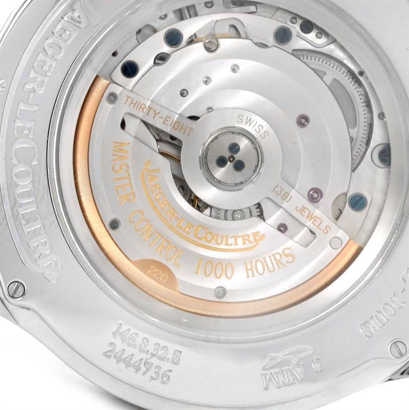 The image shows the back view of the Jaeger LeCoultre Master Q1528420 Men's Stainless Steel Silver Dial Q1528420 Men's Stainless Steel Silver Dial model, highlighting its intricate movement and engravings.