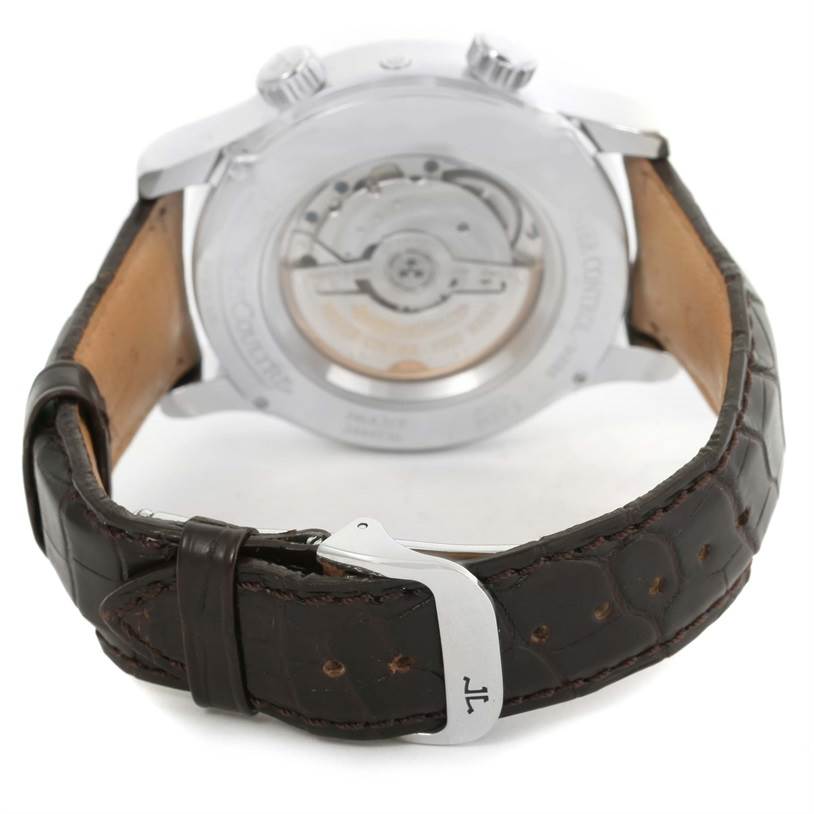 The image shows the back view of a Jaeger-LeCoultre Master model watch, highlighting its movement and leather strap.