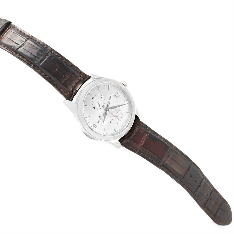 The image shows a top view of a Jaeger LeCoultre Master Q1628430 Men's Stainless Steel Silver Dial Q1628430 Men's Stainless Steel Silver Dial model watch with a brown leather strap and silver dial.