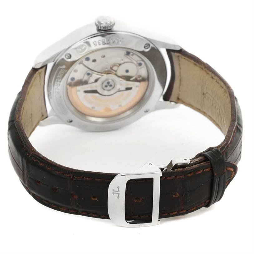 The image shows the back angle of a Jaeger LeCoultre Master Q1628430 Men's Stainless Steel Silver Dial Q1628430 Men's Stainless Steel Silver Dial model watch, displaying its automatic movement and leather strap with the buckle.