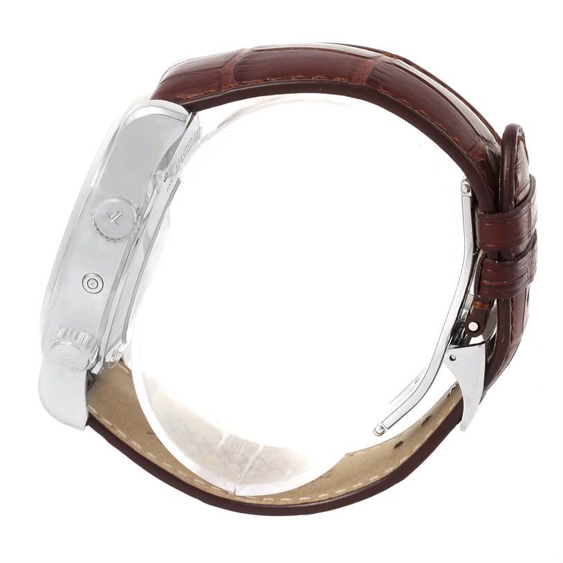 This image shows the side view of the Jaeger LeCoultre Master Q1528420 Men's Stainless Steel Silver Dial Q1528420 Men's Stainless Steel Silver Dial model watch, highlighting the case, crown, buttons, and brown leather strap.