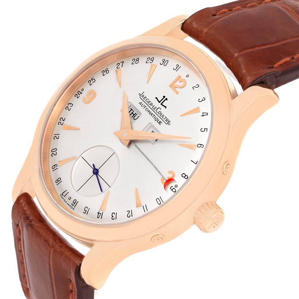 The image shows a Jaeger LeCoultre Master 140.2.87 Men's Rose Gold Silver Dial 140.2.87 Men's Rose Gold Silver Dial model watch, angled to display the face, crown, and part of the leather strap.