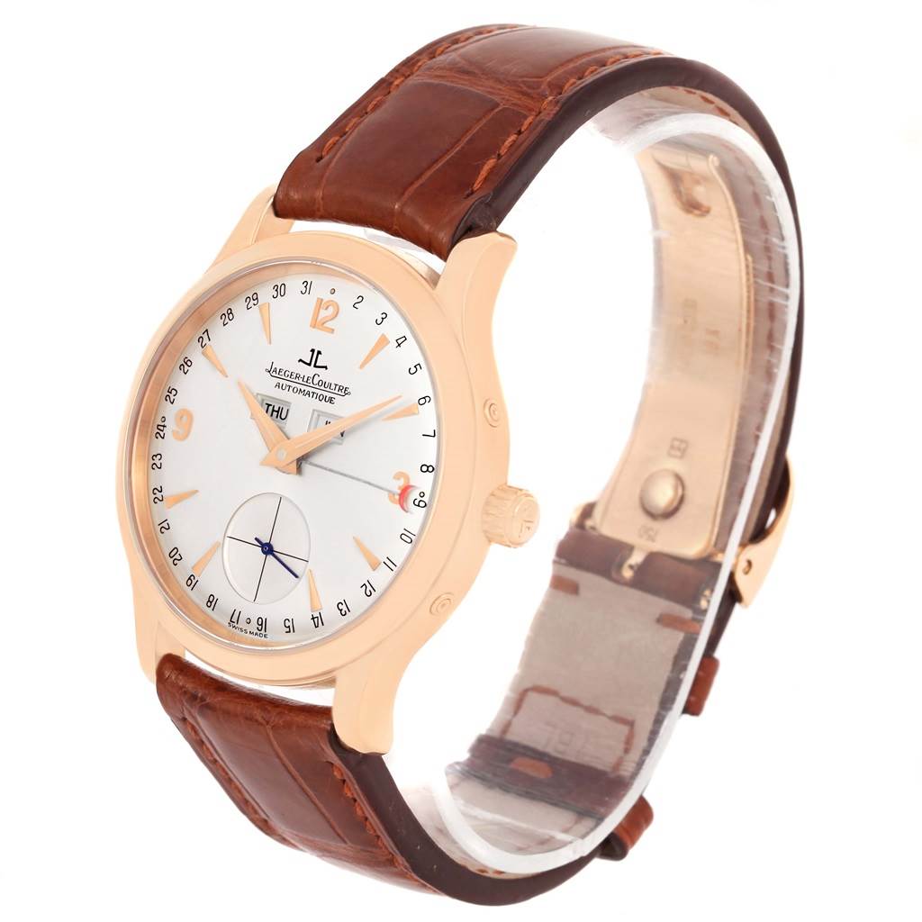 The image shows a Jaeger LeCoultre Master 140.2.87 Men's Rose Gold Silver Dial 140.2.87 Men's Rose Gold Silver Dial model watch at a three-quarter angle, highlighting its face, leather strap, and crown.