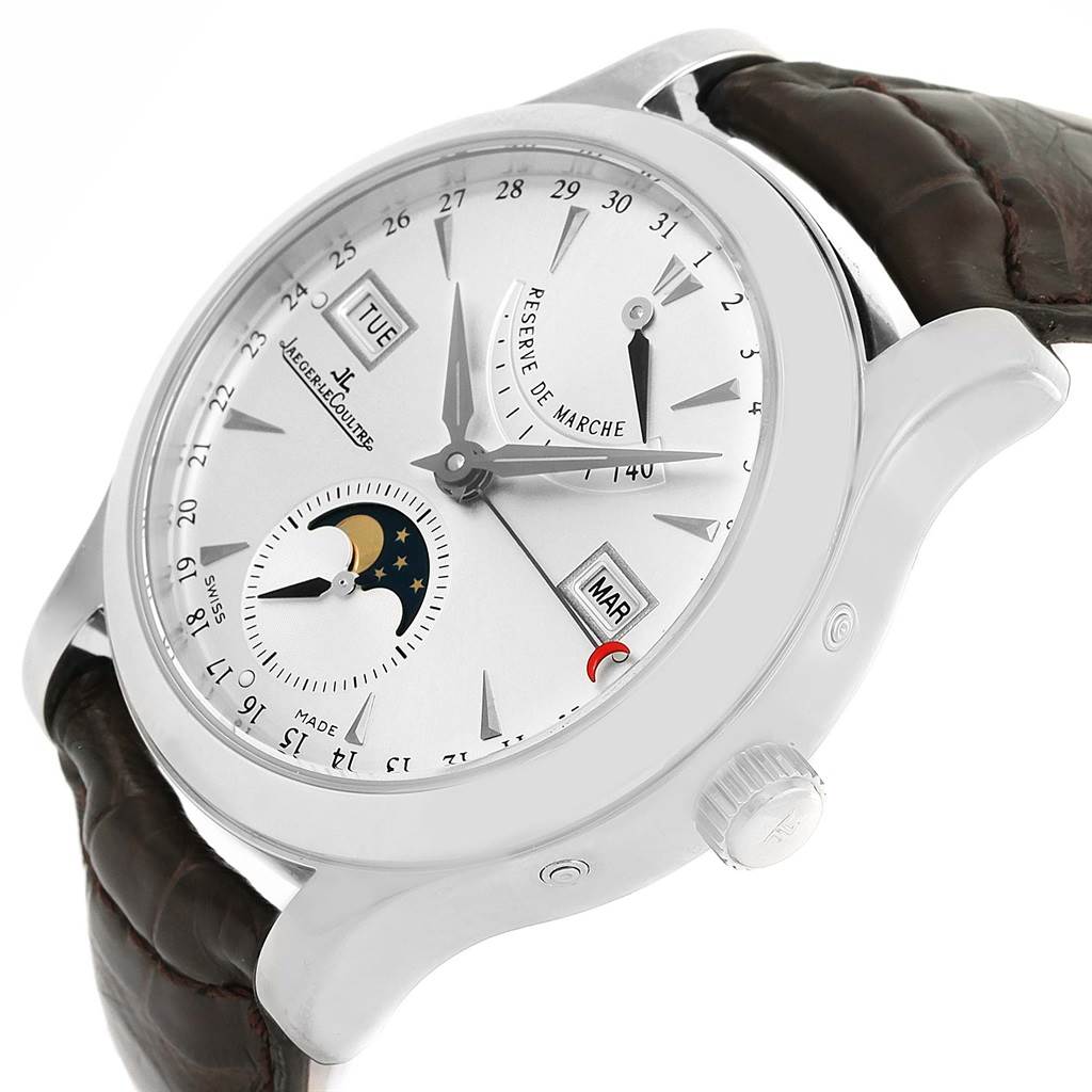 The image shows a Jaeger LeCoultre Master 147.8.41.S Men's Stainless Steel Silver Dial 147.8.41.S Men's Stainless Steel Silver Dial model watch at a three-quarter angle, featuring the dial, hands, date, day, month, moon phase, and power reserve indicators.