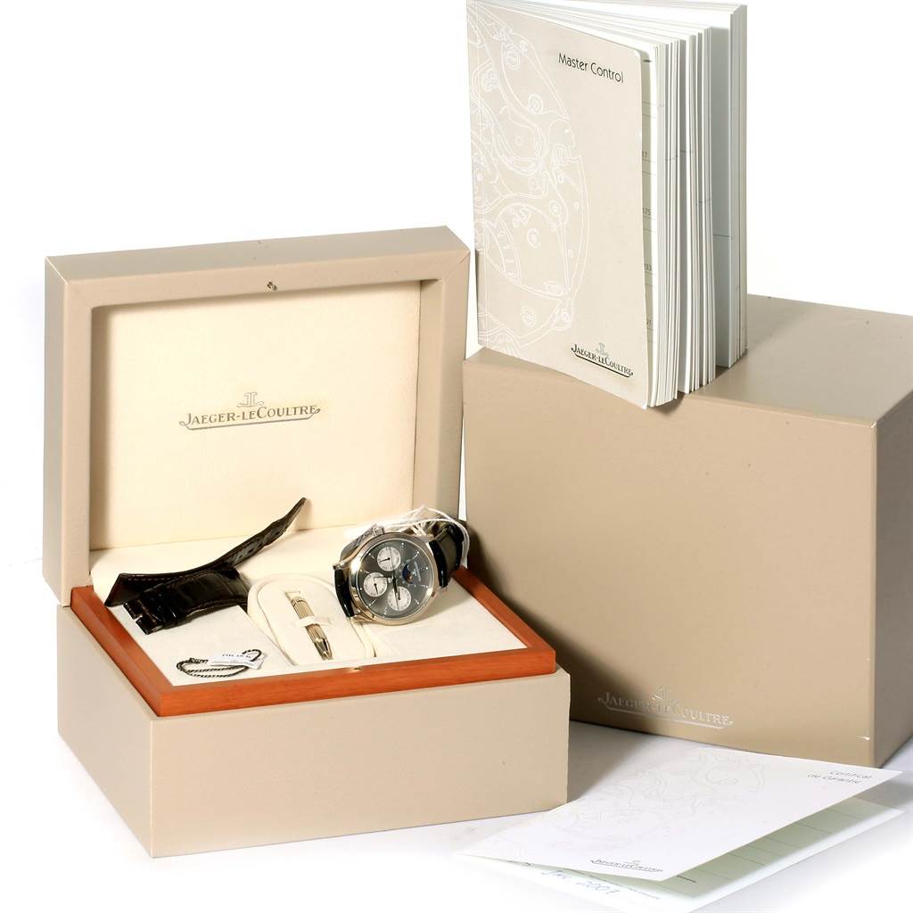 The image shows the Jaeger LeCoultre Master 140.3.80 Men's White Gold Grey Dial 140.3.80 Men's White Gold Grey Dial model watch, its accessories, original box, and instruction manual from a front angle.