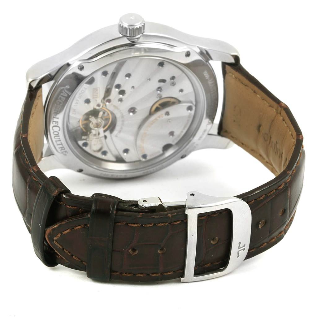 The image shows the back and strap of a Jaeger-LeCoultre Master model, highlighting the movement through the transparent case back.