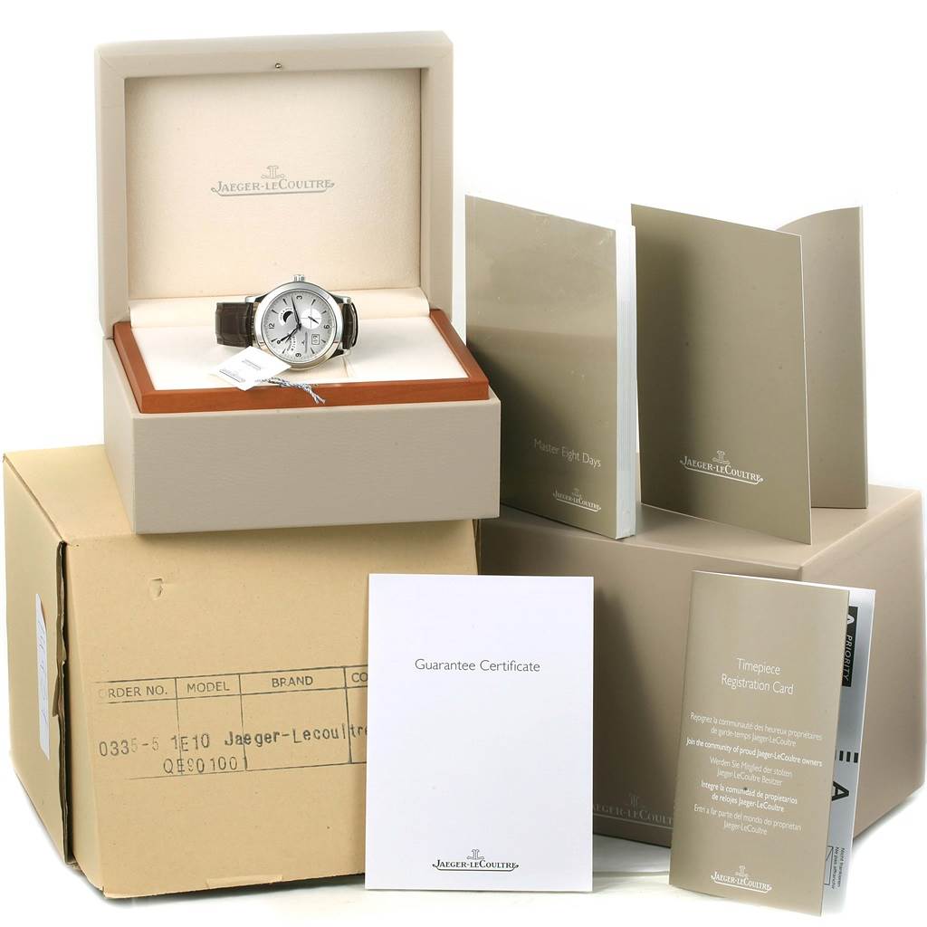 The image shows a Jaeger LeCoultre Master Q1608420 Men's Stainless Steel Silver Dial Q1608420 Men's Stainless Steel Silver Dial watch in its box, along with certificates and documentation.