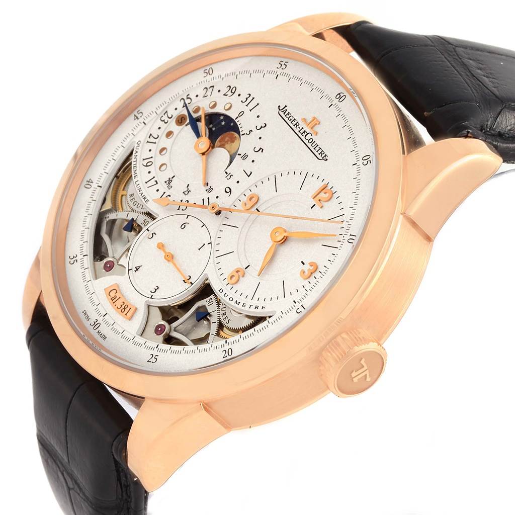 This image shows a Jaeger LeCoultre Duometre 15917 Men's Rose Gold Silver Dial 15917 Men's Rose Gold Silver Dial watch at a three-quarter angle, displaying its dial, crown, and strap.