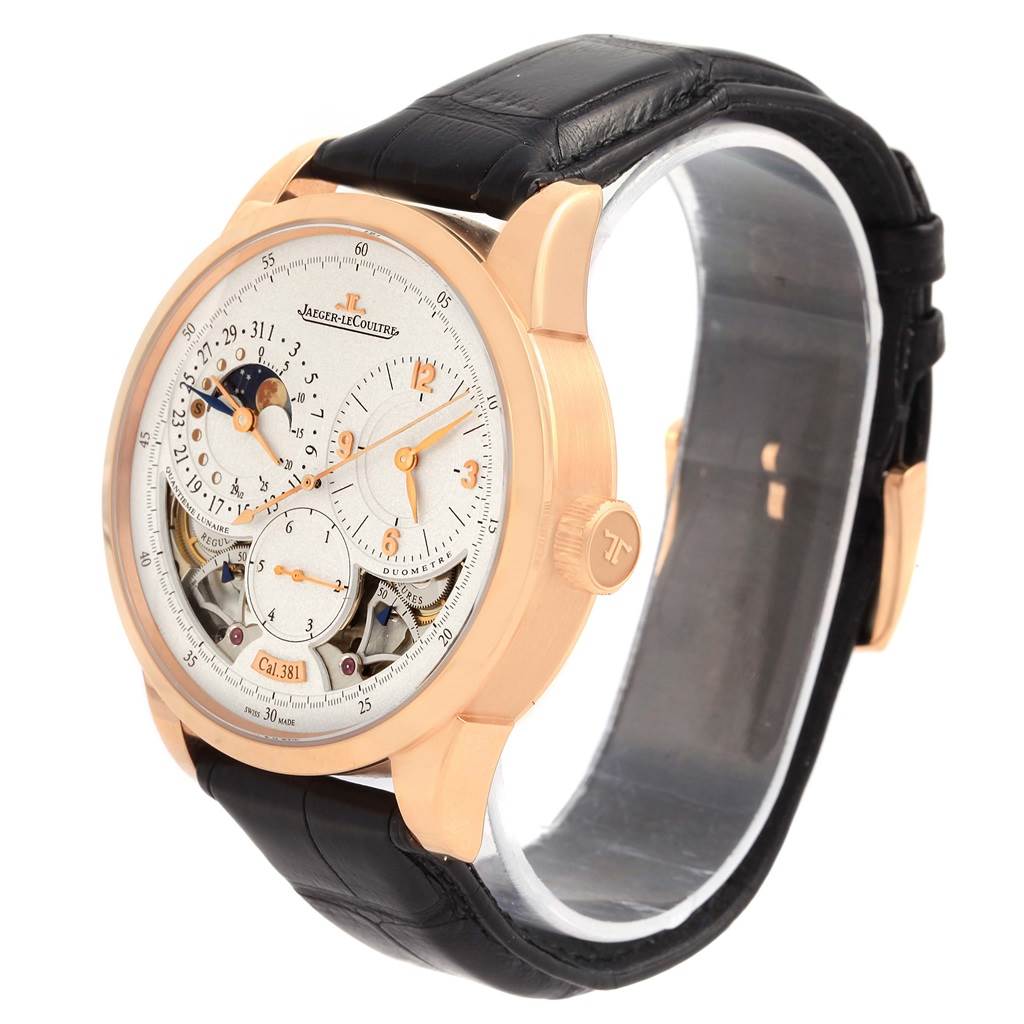 The Jaeger LeCoultre Duometre 15917 Men's Rose Gold Silver Dial 15917 Men's Rose Gold Silver Dial watch is shown at a three-quarter angle, highlighting its dial, case, crown, and leather strap.