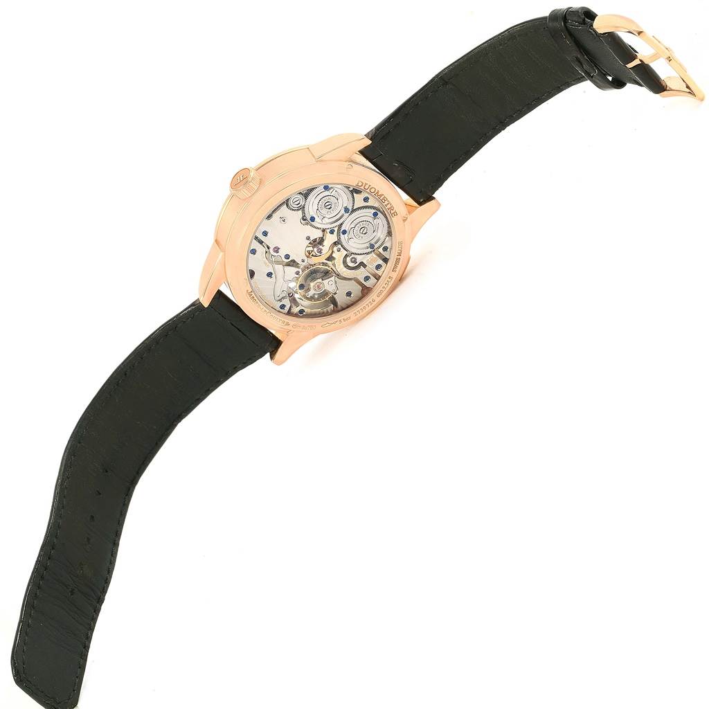The image shows the back view of a Jaeger LeCoultre Duometre 15917 Men's Rose Gold Silver Dial 15917 Men's Rose Gold Silver Dial watch, highlighting its movement and mechanism.