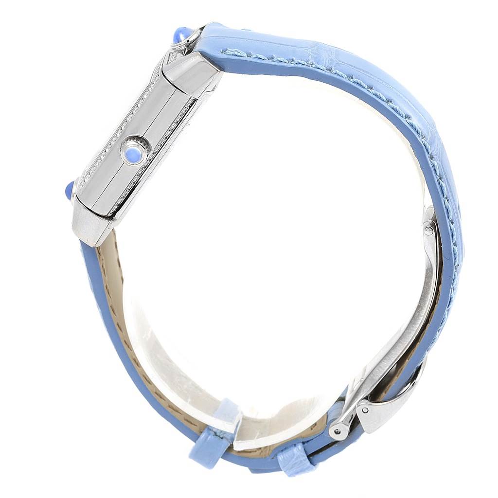 This image shows a side view of the Jaeger-LeCoultre Reverso watch, highlighting its light blue strap and polished case.