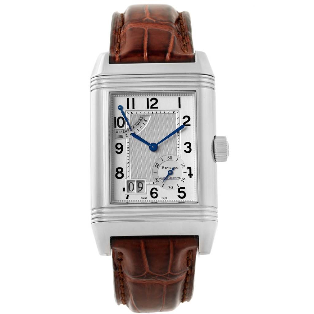 The image shows a front view of the Jaeger-LeCoultre Reverso watch, highlighting its rectangular face, dial, and leather strap.