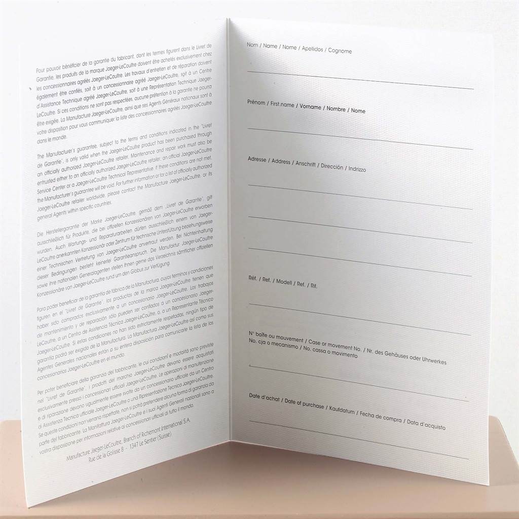 This image shows an open booklet with written information and fillable sections, likely related to a Jaeger LeCoultre Reverso 240.8.15 Men's Stainless Steel Silver Dial 240.8.15 Men's Stainless Steel Silver Dial watch warranty.