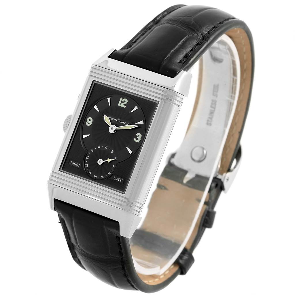 The image shows a Jaeger-LeCoultre Reverso watch at a slight angle, highlighting its rectangular face, dial, and leather strap.