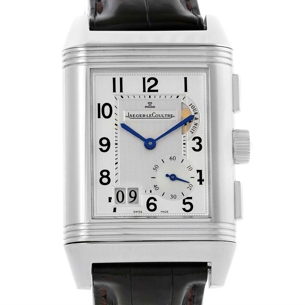 This image displays a front view of a Jaeger LeCoultre Reverso Q3028420 Men's Stainless Steel Silver Dial Q3028420 Men's Stainless Steel Silver Dial watch, highlighting the dial, crown, day/night indicator, and leather strap.