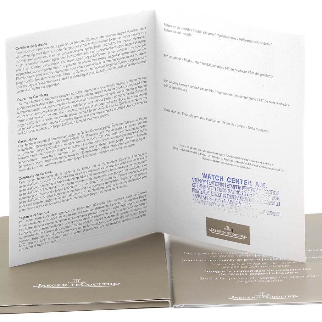 The image shows the warranty booklet of the Jaeger-LeCoultre Reverso watch, opened to display the text inside.