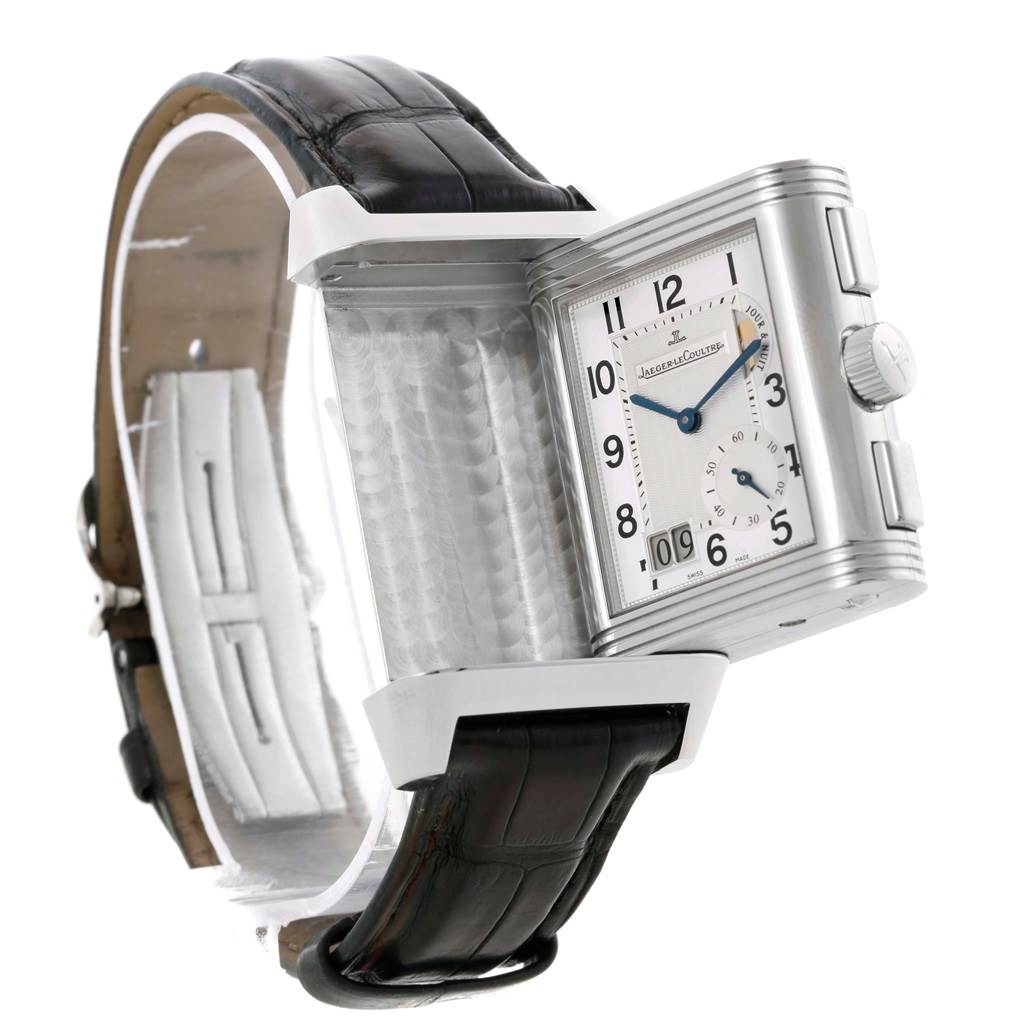 The image shows a Jaeger LeCoultre Reverso Q3028420 Men's Stainless Steel Silver Dial Q3028420 Men's Stainless Steel Silver Dial watch at an angle highlighting the front dial and partially revealed case-back with the strap.
