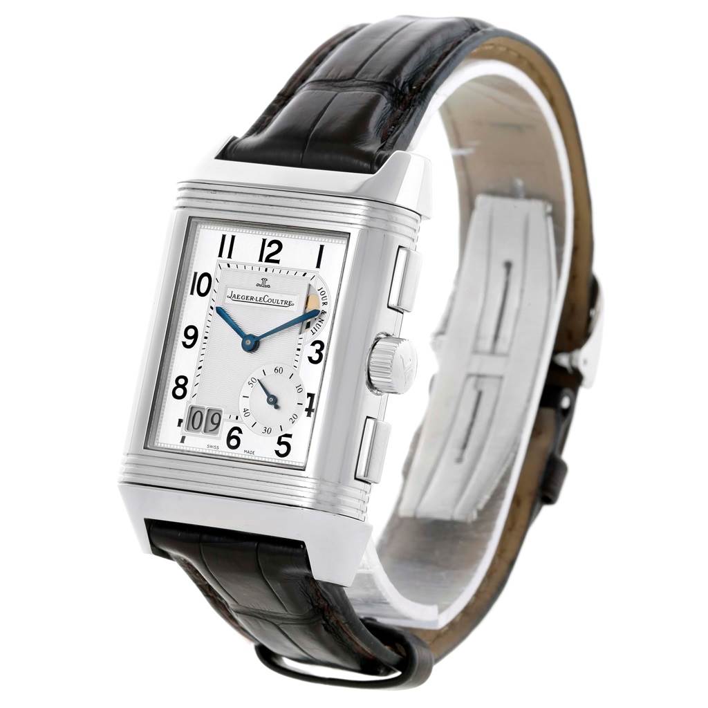 The image shows a Jaeger LeCoultre Reverso Q3028420 Men's Stainless Steel Silver Dial Q3028420 Men's Stainless Steel Silver Dial watch from an angled side view, displaying its dial, crown, pushers, and leather strap.