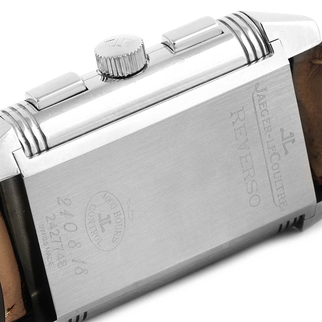 The image shows the back case and side view of the Jaeger-LeCoultre Reverso watch, including the crown and engravings.