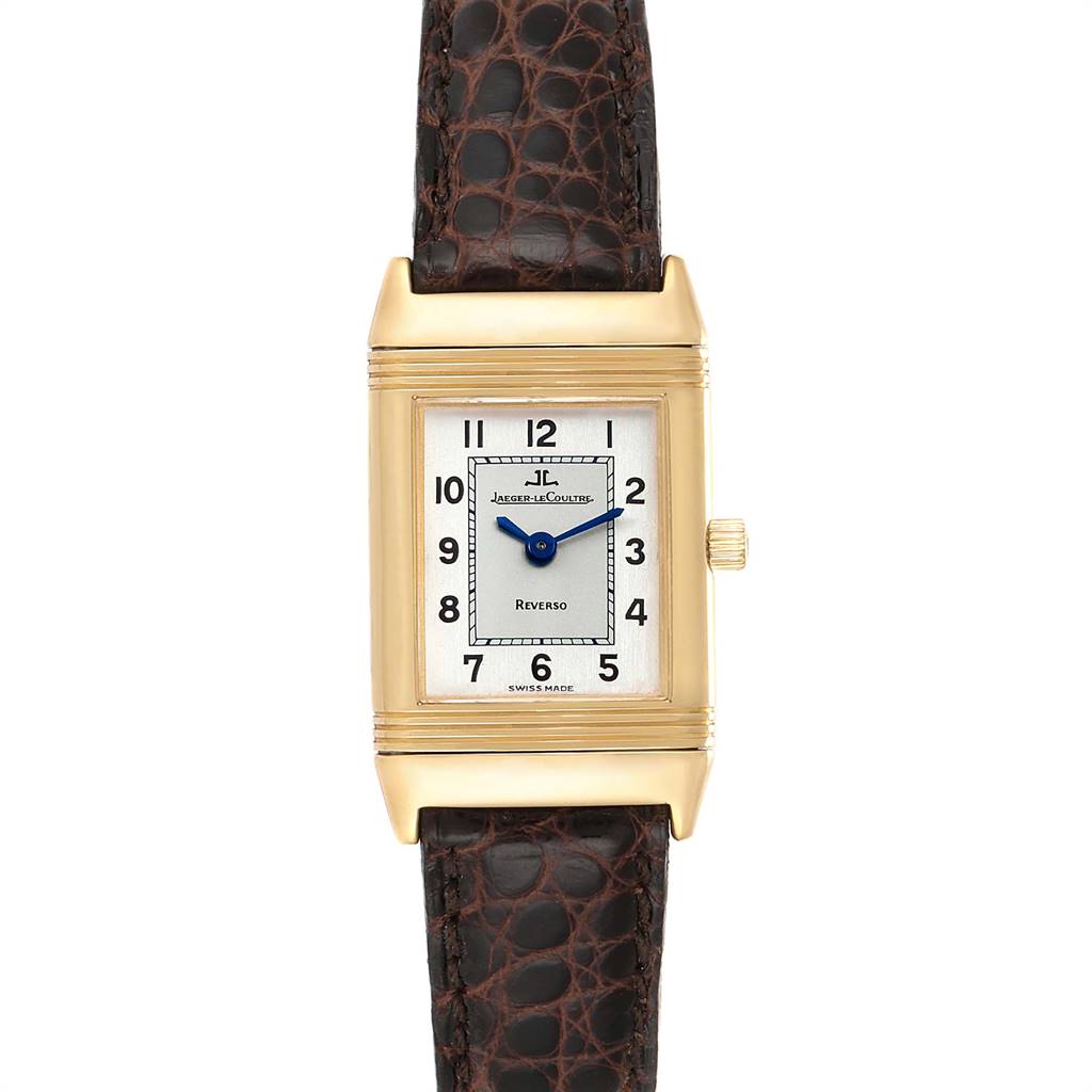 The image shows a frontal view of the Jaeger LeCoultre Reverso 260.1.86 Women's Yellow Gold Silver Dial 260.1.86 Women's Yellow Gold Silver Dial watch, displaying the dial, hands, and leather strap.