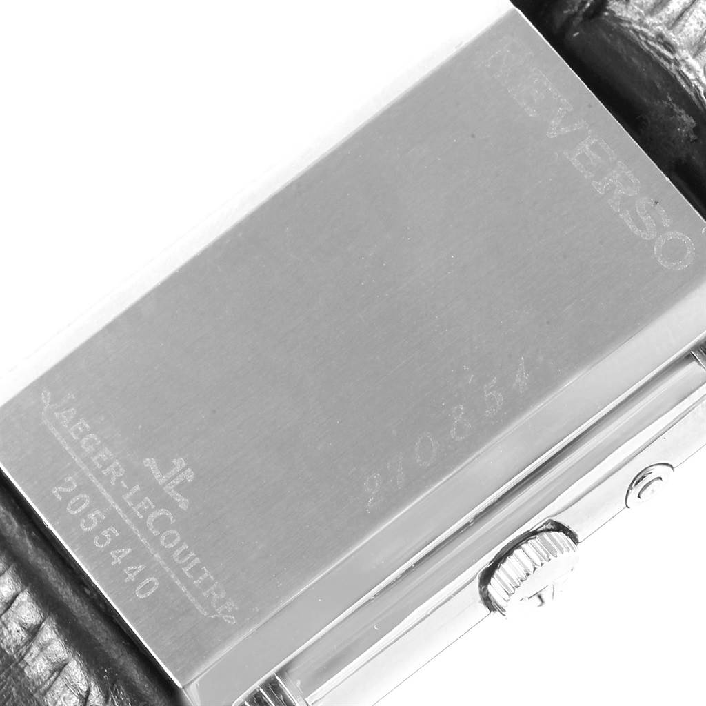 This image shows the back case and crown of a Jaeger-LeCoultre Reverso watch mostly from the back-side angle.